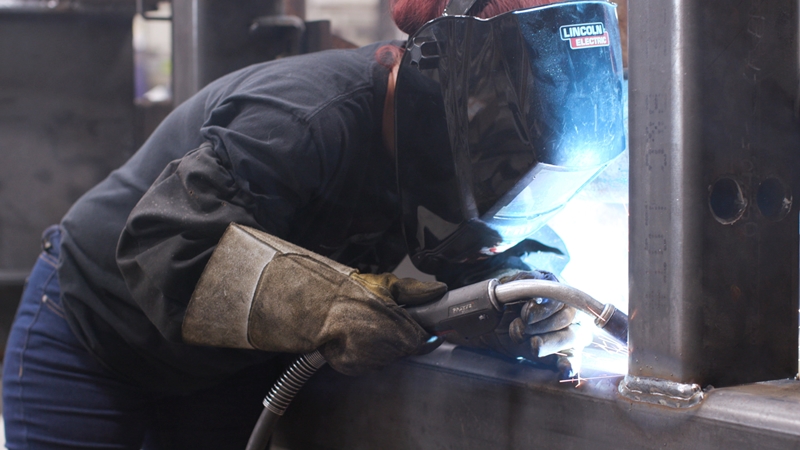 Photo of a welder, for story on skilled trades