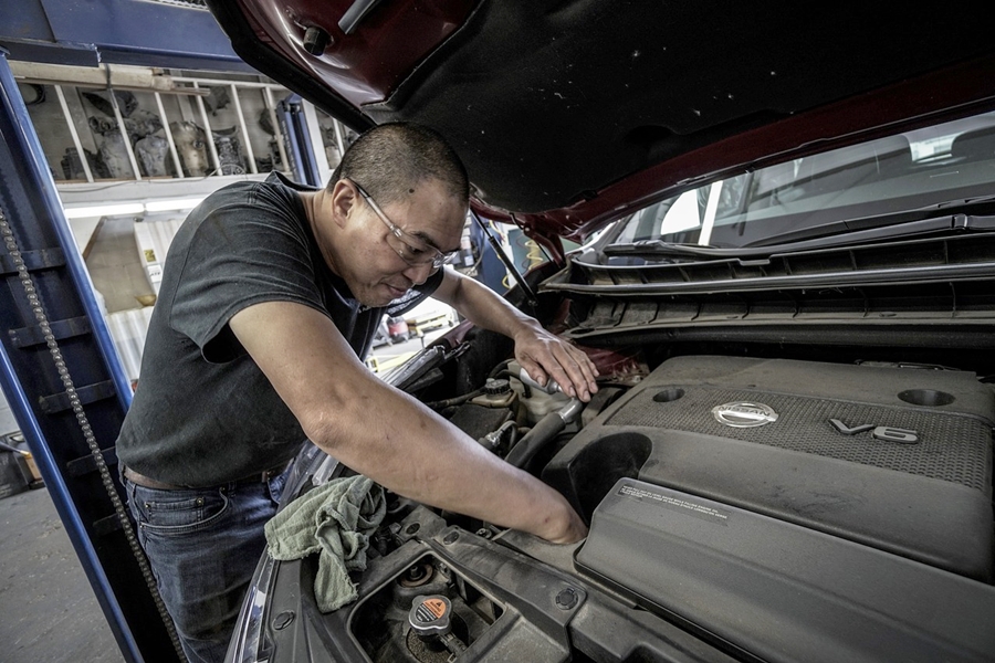 Photo illustration showing auto mechanic